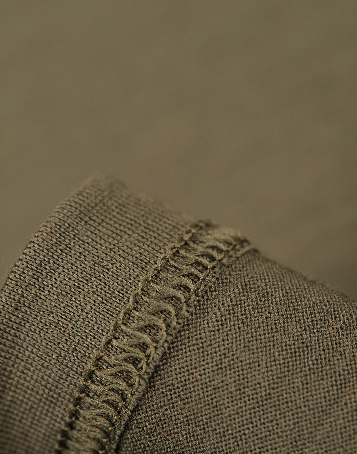 Women's merino wool racerback tank top in Moss - $56.99