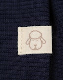 Luffer i merinouldfleece til baby Blå