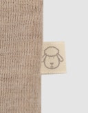 Langermet topp i merinoull til baby Beigemelert