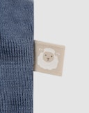 Body uten ermer i merinoull til baby Tordenblå