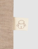 One-piece u/føtter i merinoull til baby Beigemelert
