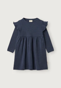 Kjole med rysjer i merinoull til baby