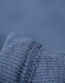 Langermet body i merinoull til baby Tordenblå