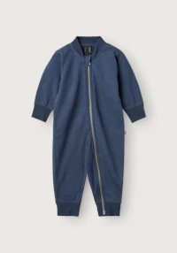 One-piece i merinoullfrotté til baby