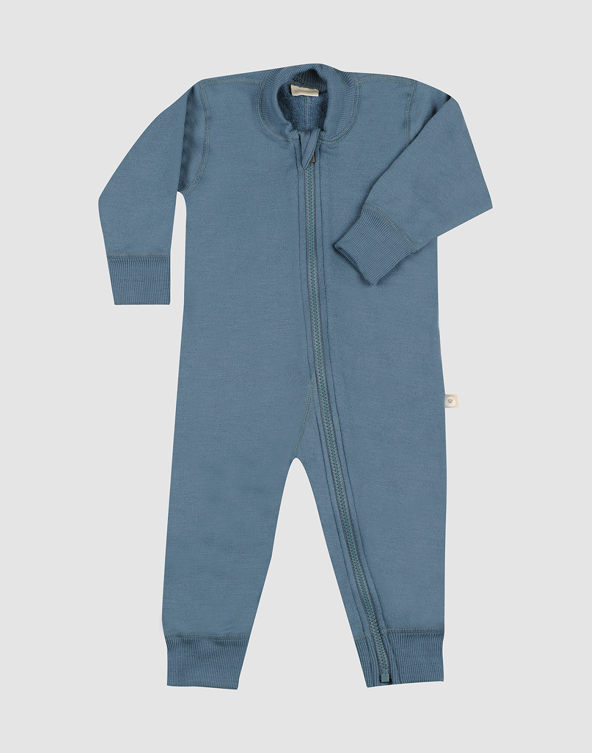 One-piece i merinoullfrotté til baby