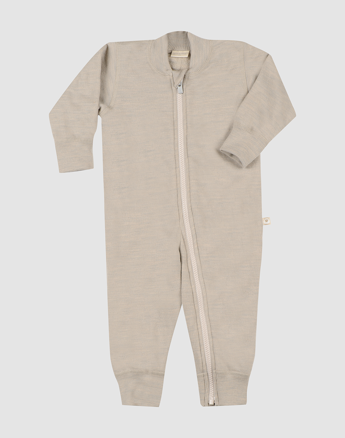 One-piece i merinoullfrotté til baby
