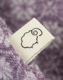 Langermet topp i merinoull med nordisk mønster til baby Nordic lilac melange