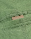 Leggings i merinoull/silke til baby Pæregrønn