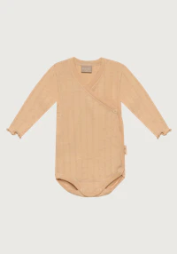 Body med omslag i merinoull/silke med pointellemønster til baby