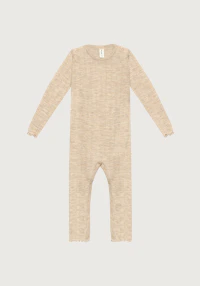 One-piece med hullmønster i merinoull/silke til baby