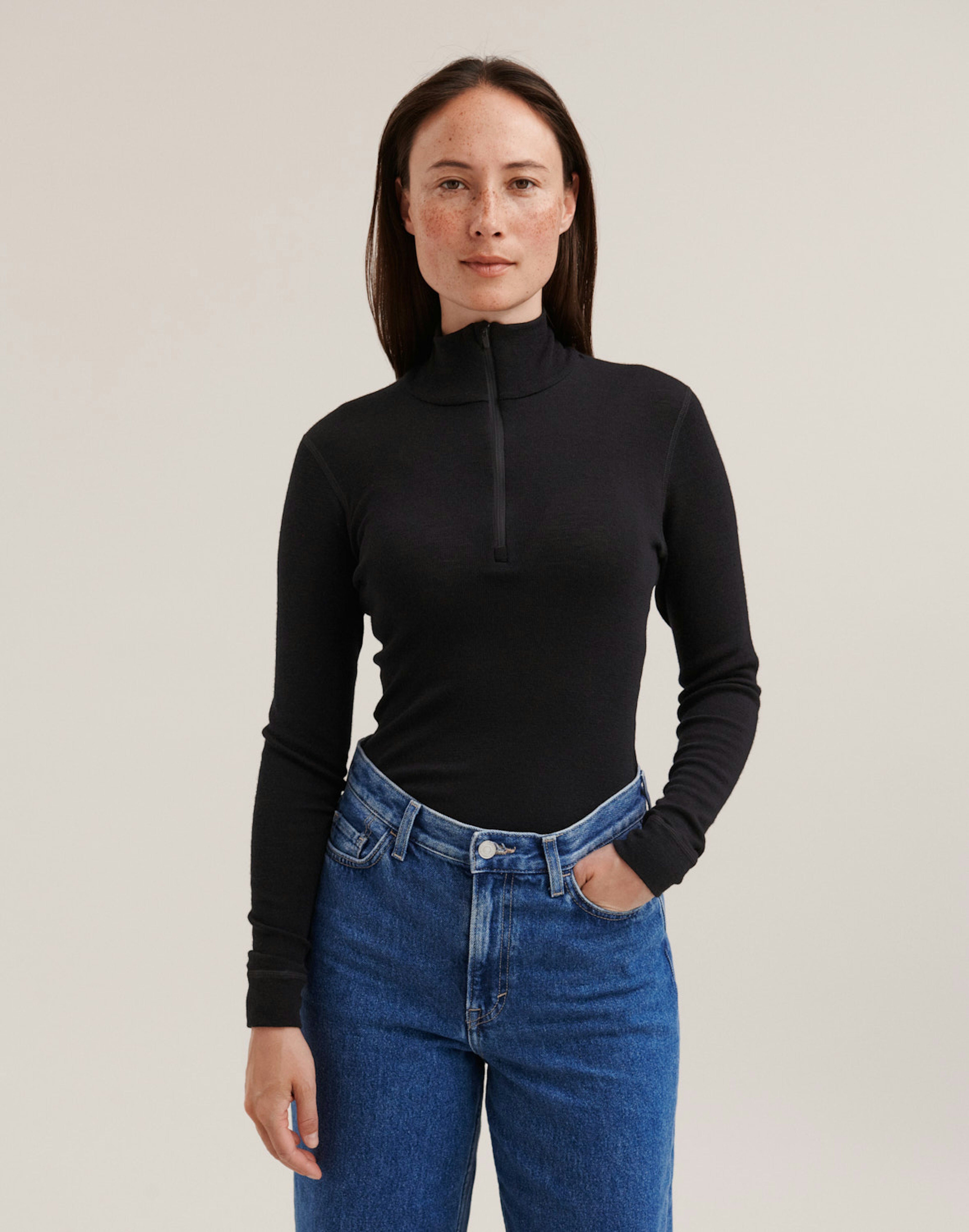 Bluse med lynlås i merinould til kvinder Sort