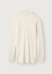 Langermet hullstrikket topp i merinoull til dame