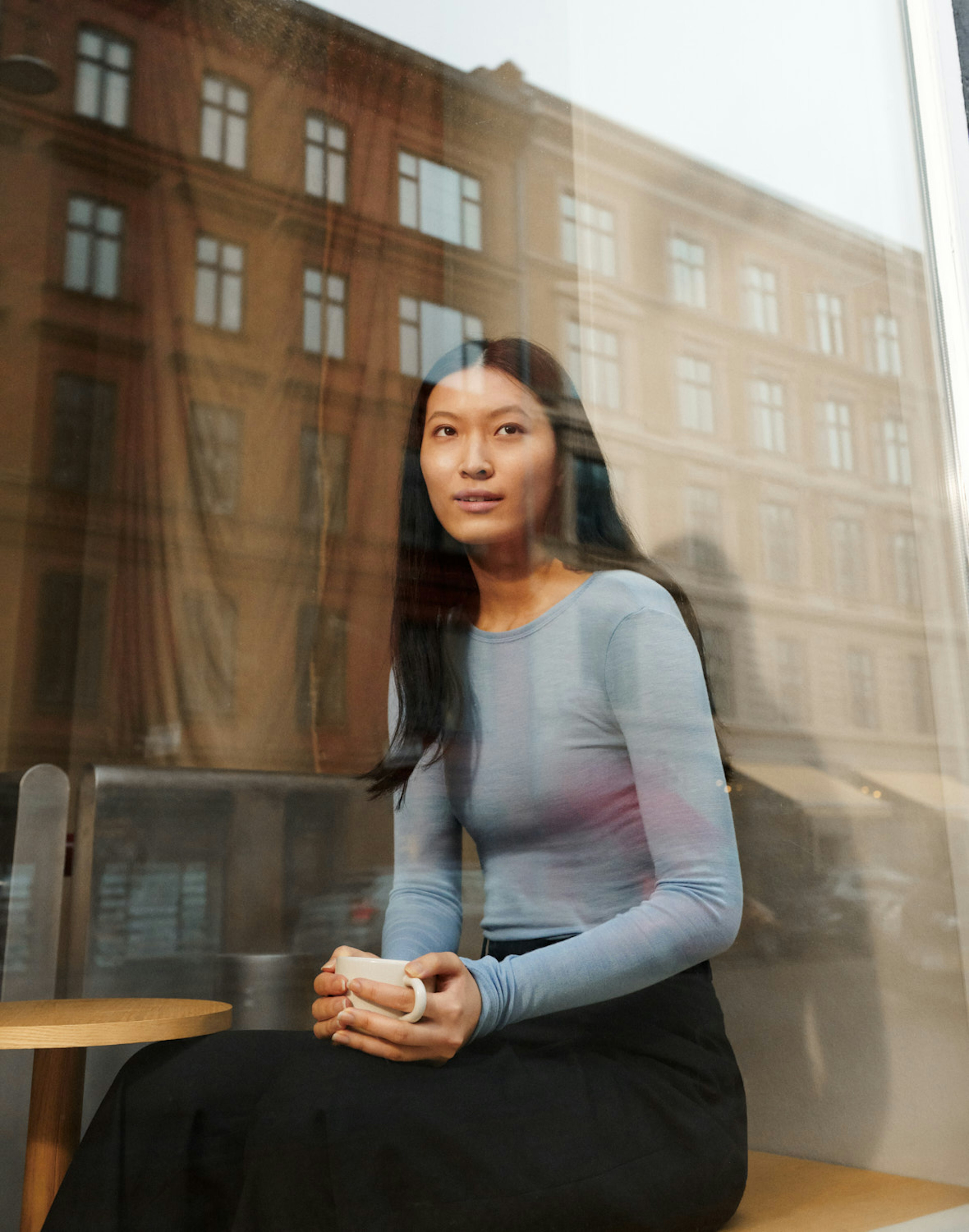 Långärmad topp i merinoull/siden för dam Nordisk blå