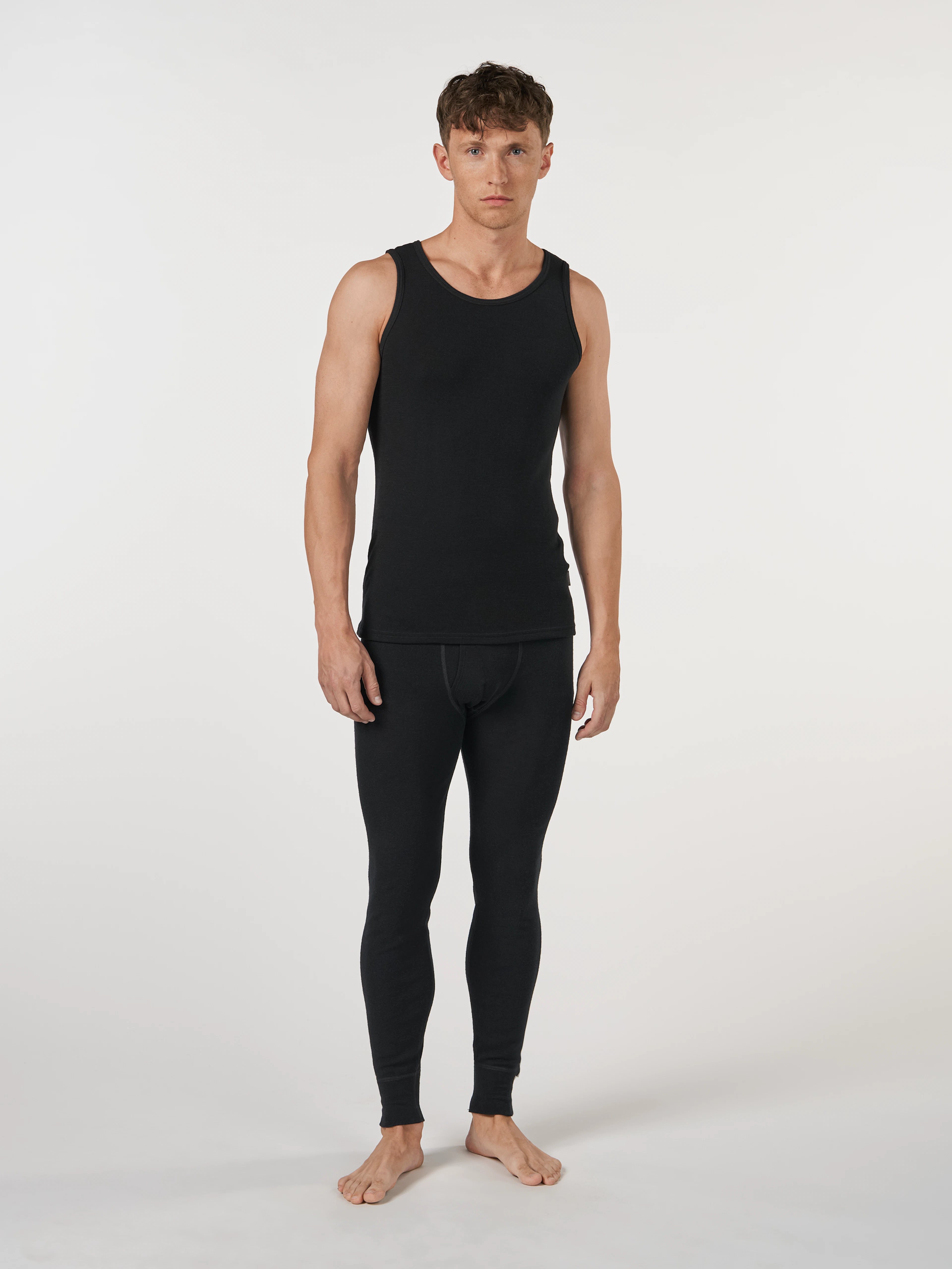 Men's merino wool tank top in Black - $71.99 - Dilling