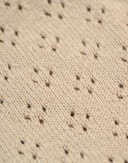 Hullstrikket bomullsvest til baby Beige