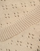 Bomullstruser med hullmønster til baby Beige
