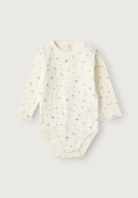 Langermet bomullsbody med hullmønster til baby